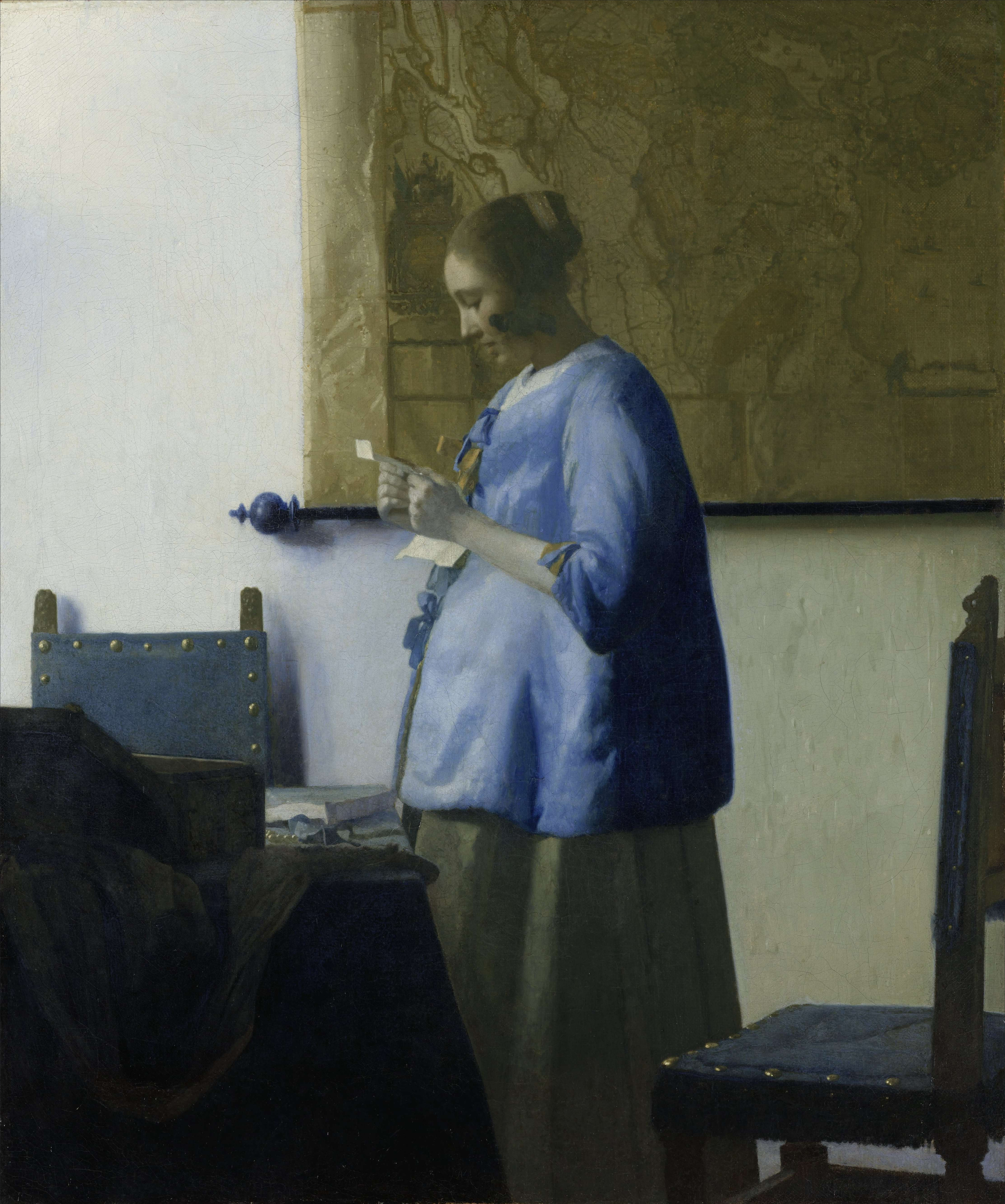 Donna in blu che legge una lettera di Johannes Vermeer